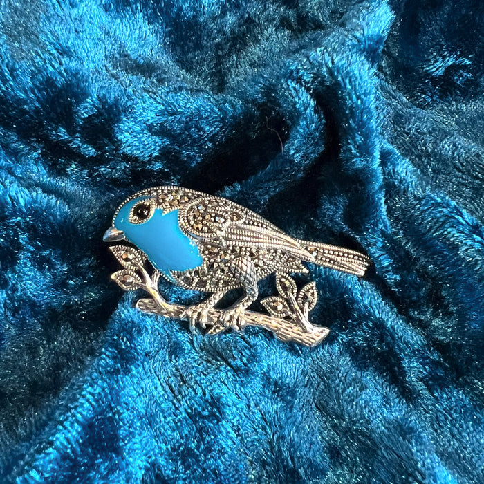 Blue bird sitting on a branch silver Marcasite brooch