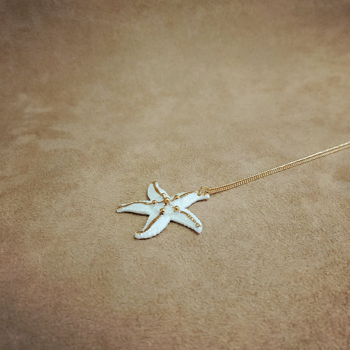 White Starfish Pendant Necklace by And Mary in Porcelaine - The Hirst Collection