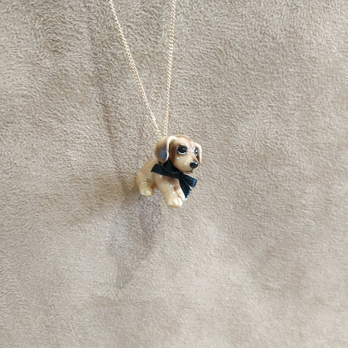 Brown Dachshund Puppy Necklace And Mary