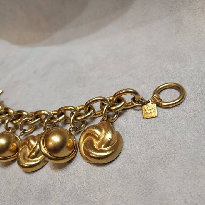 Ann Klein golden charm bracelet vintage - The Hirst Collection