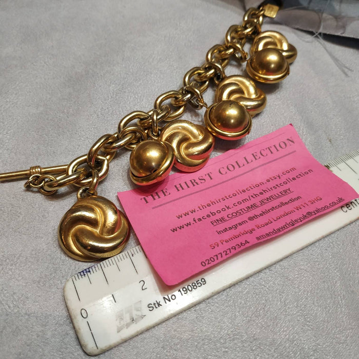 Ann Klein golden charm bracelet vintage - The Hirst Collection
