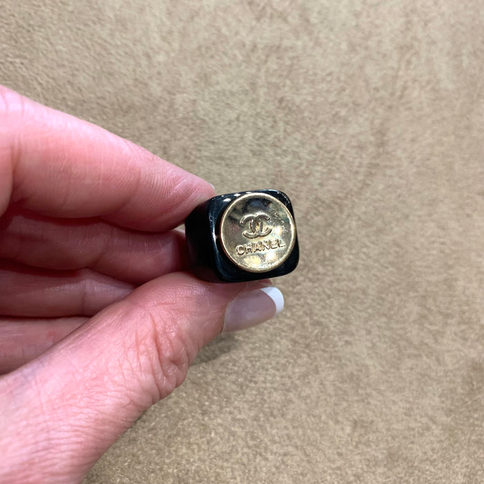 Vintage Chanel gold button ring in black setting - The Hirst Collection