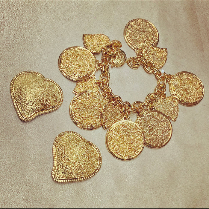 Yves Saint Laurent Large gold heart earrings - The Hirst Collection