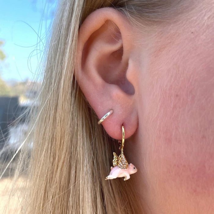 Flying Pig huggie hoop earrings by Bill Skinner