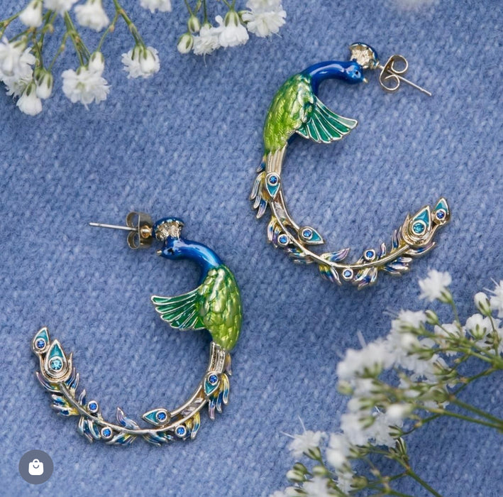 Peacock hoop earrings  by Bill Skinner