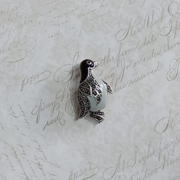 Silver enamel penguin brooch - The Hirst Collection