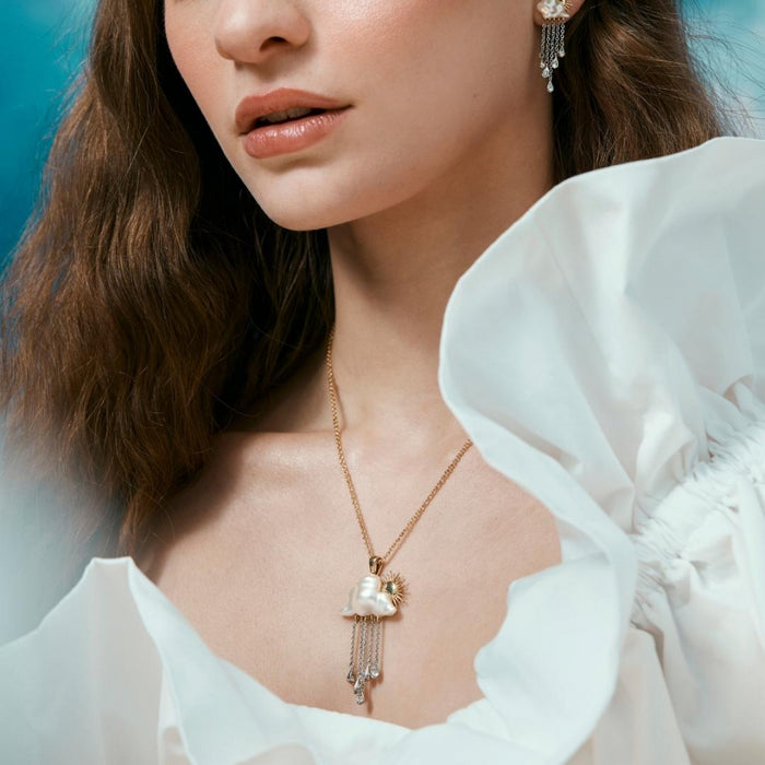 Cloud drop necklace by Bill Skinner