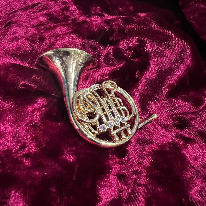 Gold French Horn Brooch  by Cabouchon