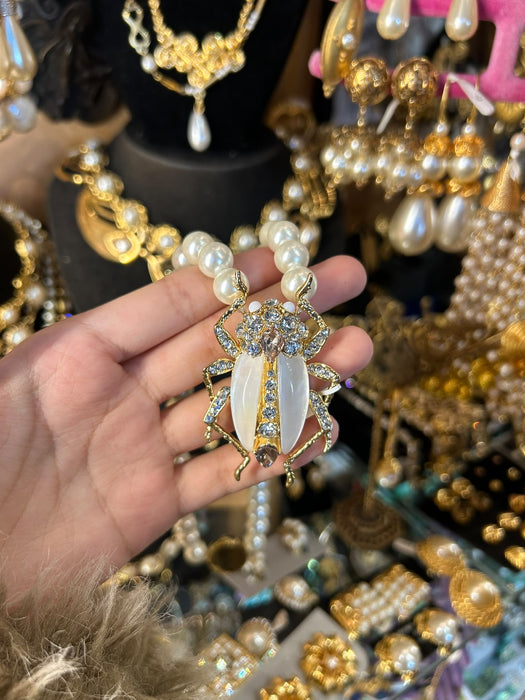 Bejewelled Pearl Bug necklace by Bill Skinner