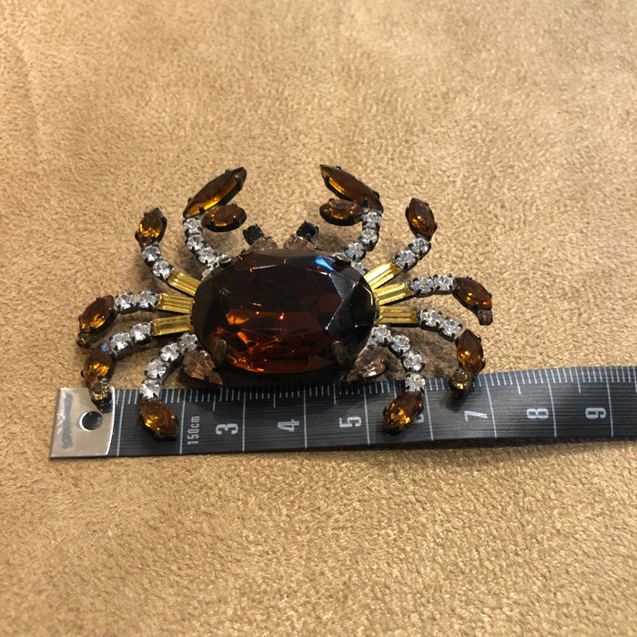 Reserved:  crab brooch