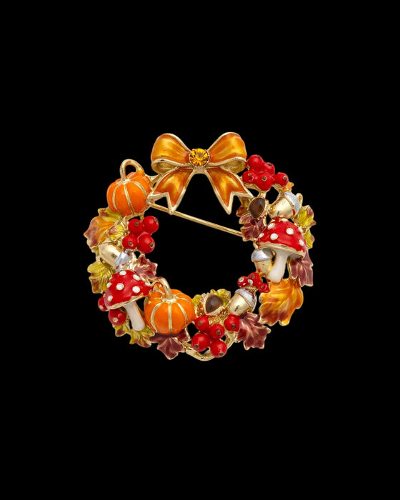 Autumn wreath brooch with pumpkin and toadstools by Bill Skinner