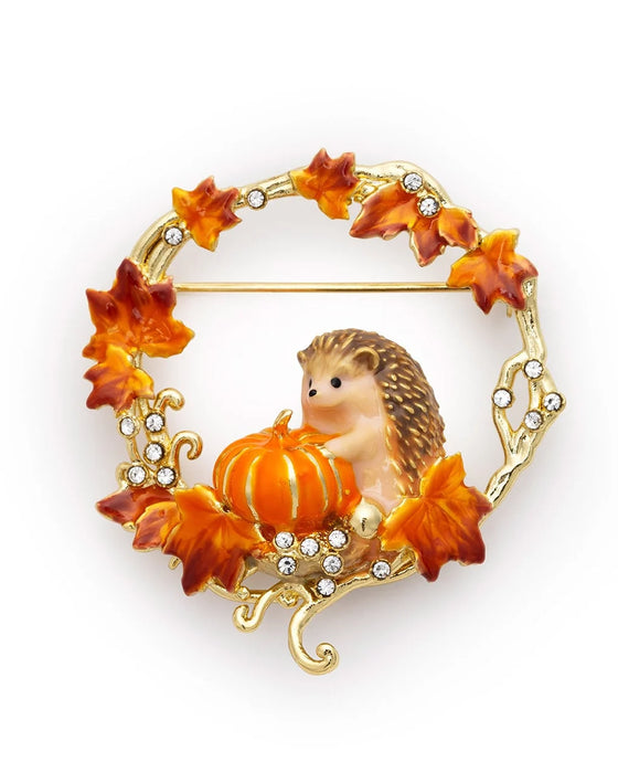 Hedgehog Pumpkin wreath brooch by Bill Skinner
