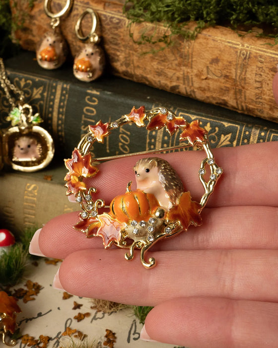 Hedgehog Pumpkin wreath brooch by Bill Skinner