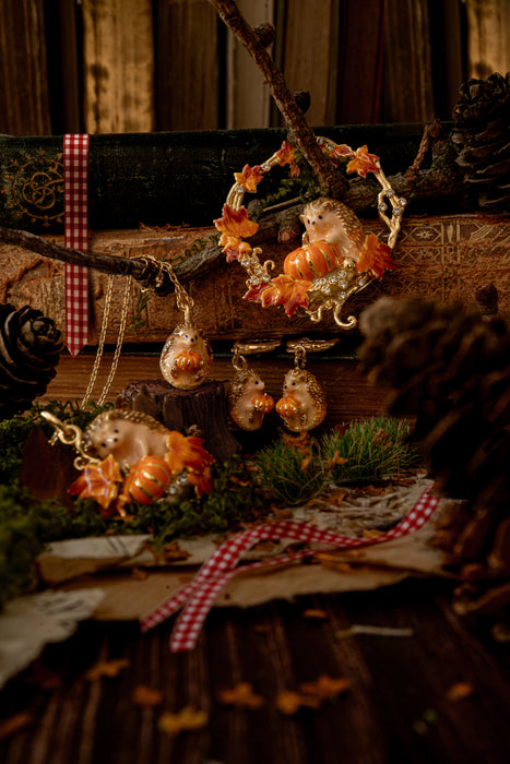 Hedgehog Pumpkin wreath brooch by Bill Skinner