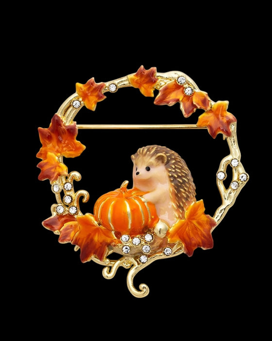 Hedgehog Pumpkin wreath brooch by Bill Skinner