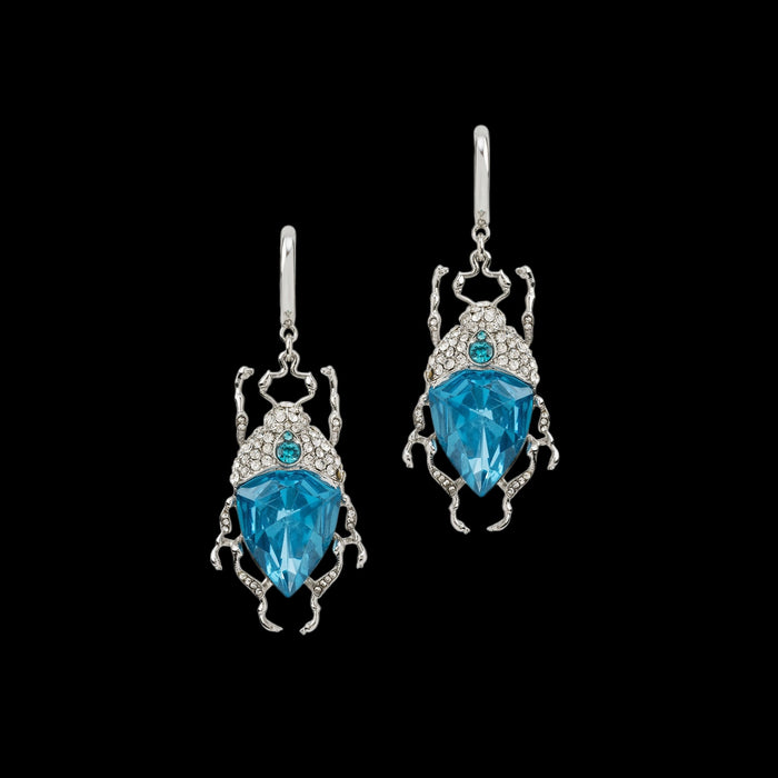 Icy blue bug earrings by Bill Skinner