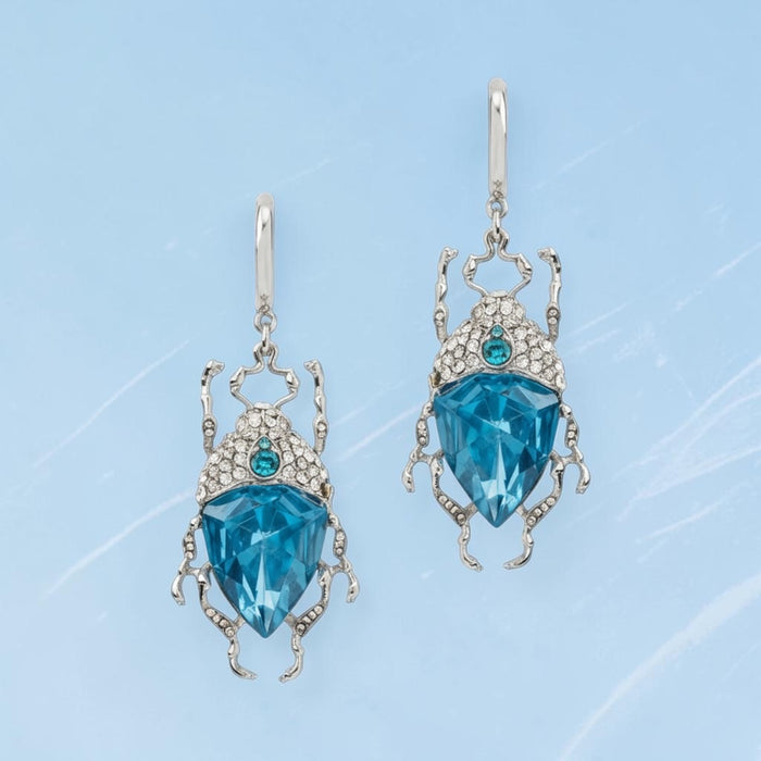 Icy blue bug earrings by Bill Skinner