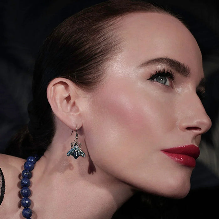 Blue Moth earrings by Bill Skinner