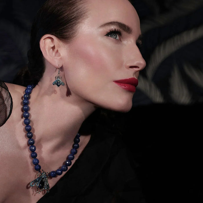 Blue Moth earrings by Bill Skinner
