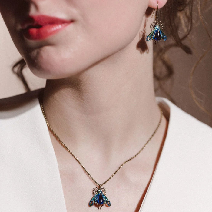 Blue Moth earrings by Bill Skinner