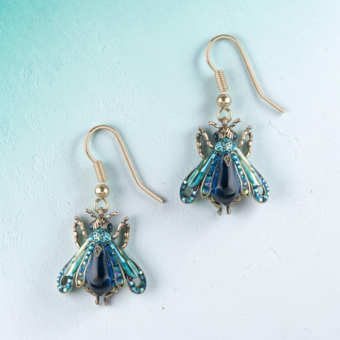 Blue Moth earrings by Bill Skinner