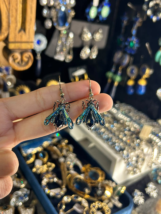 Blue Moth earrings by Bill Skinner