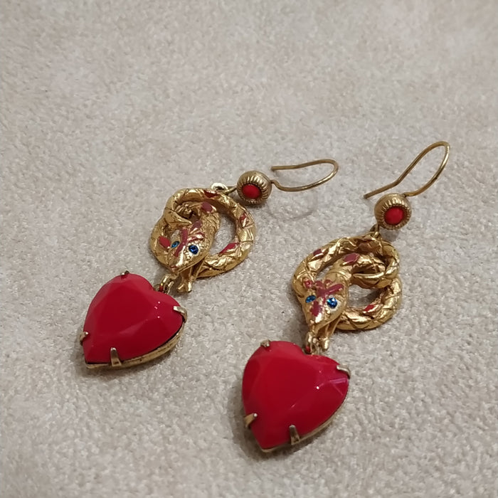 Snake Charm earrings by Askew London with red heart charms unsigned - The Hirst Collection