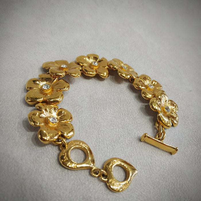 Yves Saint Laurent golden flower bracelet - The Hirst Collection