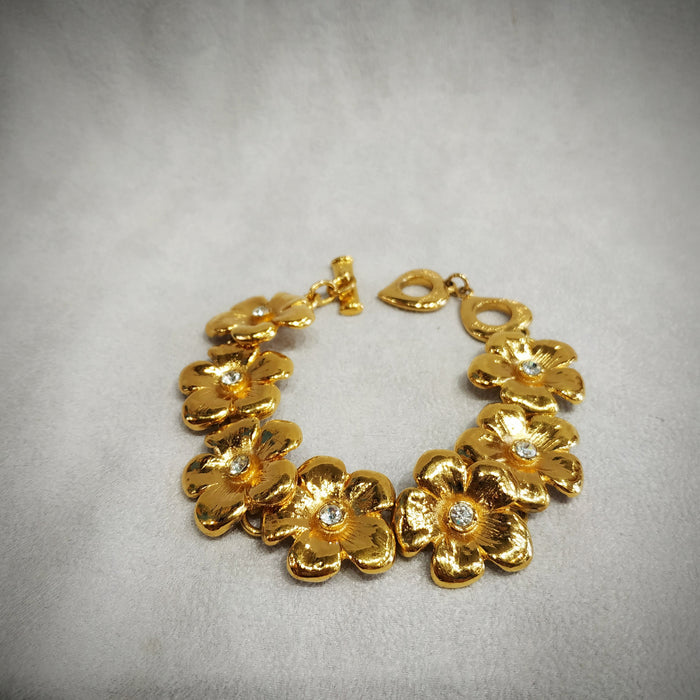 Yves Saint Laurent golden flower bracelet - The Hirst Collection