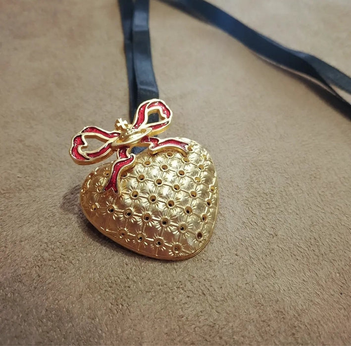 Vivienne Westwood Golden Heart brooch pendant with Red Bow