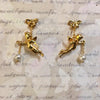 Flying cherub Pearl Earrings by Bill Skinner - The Hirst Collection
