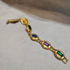 Vintage purple/blue/green glass bracelet by Trifari - The Hirst Collection