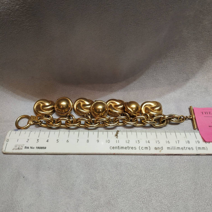 Ann Klein golden charm bracelet vintage - The Hirst Collection