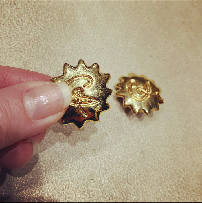 Christian Lacroix gold Starburst clip on earrings - The Hirst Collection