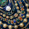 Vintage Trifari Necklace with ruby emerald sapphire glass stones gold - The Hirst Collection