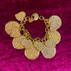 Yves Saint Laurent Gold Charm bracelet with hearts - The Hirst Collection