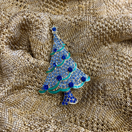 Icy blue Christmas tree brooch with green ribbon. - The Hirst Collection