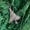 Icy Blue Christmas tree brooch with a star in gold tone. - The Hirst Collection
