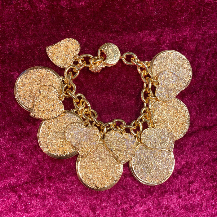 Yves Saint Laurent Gold Charm bracelet with hearts - The Hirst Collection
