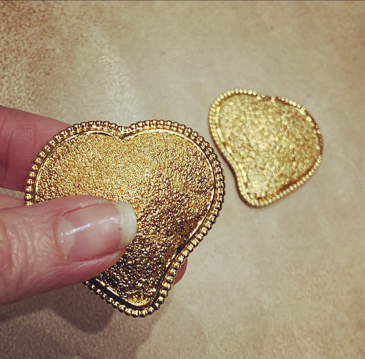 Yves Saint Laurent Large gold heart earrings - The Hirst Collection