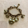 Pearl charm bracelet by Butler and Wilson - The Hirst Collection