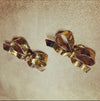 Yves Saint Laurent gold bow earrings - The Hirst Collection