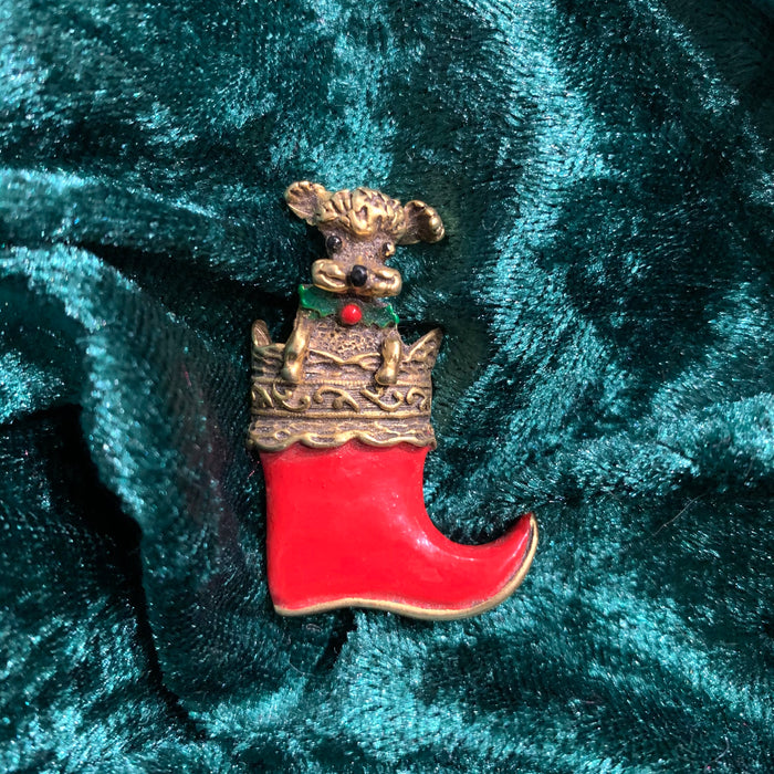 Dog in a stocking Christmas brooch by Butler and Wilson - The Hirst Collection